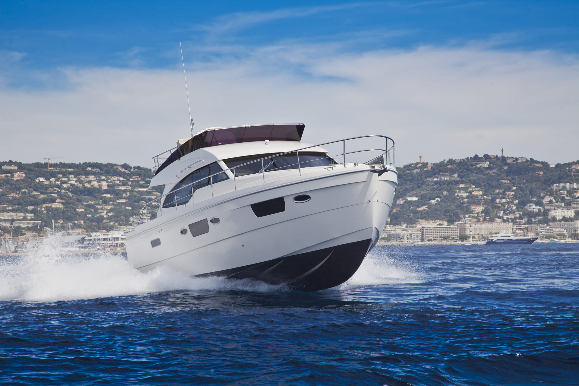 Huge yacht ripping through the water at high speed