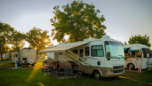 Sun Going Down At The Rv Park With Lights On