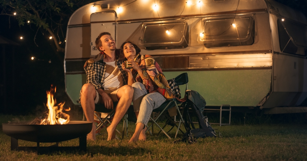 Young Couple Enjoying a Financed Camper